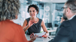 A financial professional meets with her clients to discuss how they can use life insurance to help with their retirement funding.